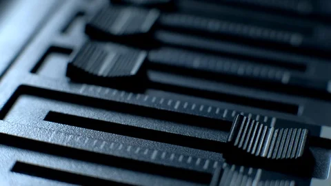 Professional sound engineer balancing volume of audio inputs of digital audio Stock Footage 88655087