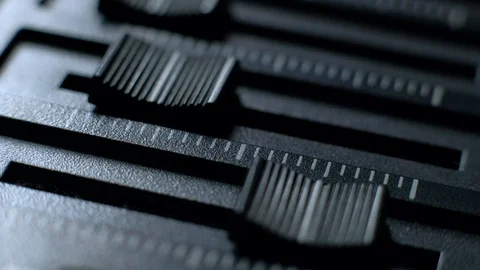 Professional sound engineer balancing volume of audio inputs of digital audio Stock Footage 88655395