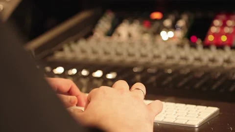 Professional Sound Engineer Operating Audio Mixer And Computer In Studio Stock Footage 330047251