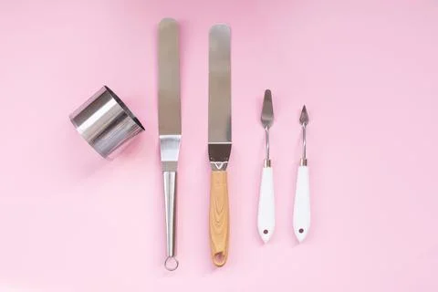Professional spatula set for quick glazing of large cakes. Confectioner's t.. Stock Photos