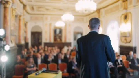 Professional speaker. Lecture, seminar or conference hall with people Stock Footage 106498380