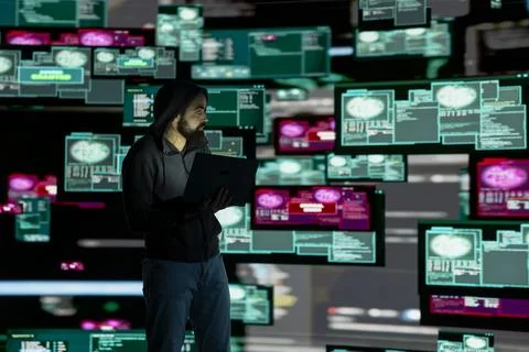 Professional spy compromising cyber security through malware and viruses Stock Photos
