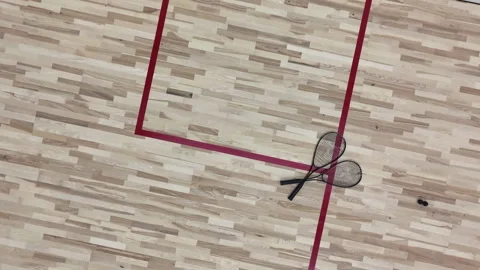 Professional Squash Rackets Lying on the Court Stock Footage 274306584