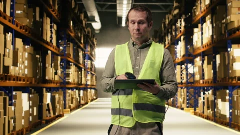 Professional staff scanning barcodes during order fulfillment process Stock Footage 332908413
