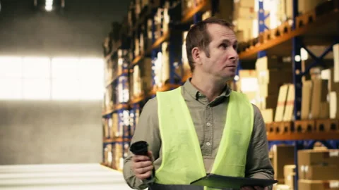 Professional staff scanning barcodes during order fulfillment process Stock Footage 332910897