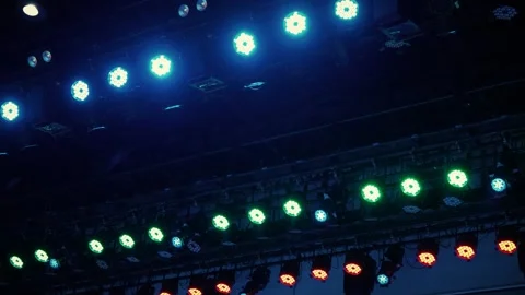 Professional stage lighting rig with colorful LED lights on truss Stock Footage 346350680