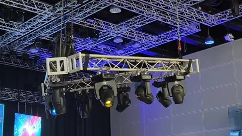 Professional stage lighting rig suspended from a metal truss structure Stock-Footage 336859613