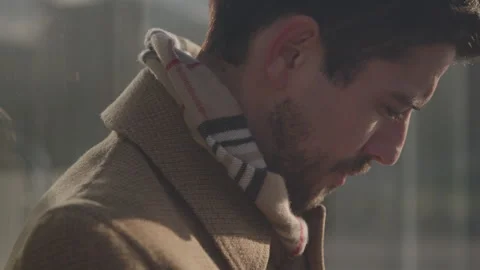 Professional Standing Outdoors Looking Down Video stock 270336151