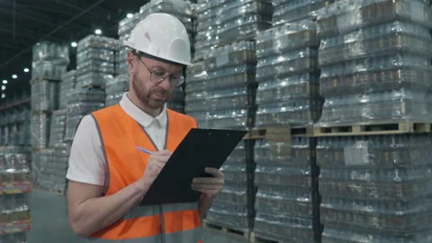 Professional Storage Warehouse Manager Registers Inventory Of Goods Shipment Stock Footage 303583218
