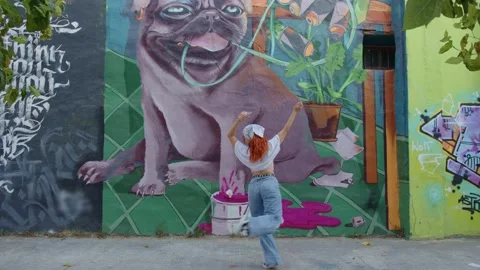 Professional street dancer dancing to hip hop against urban graffiti Stock Footage 229175782