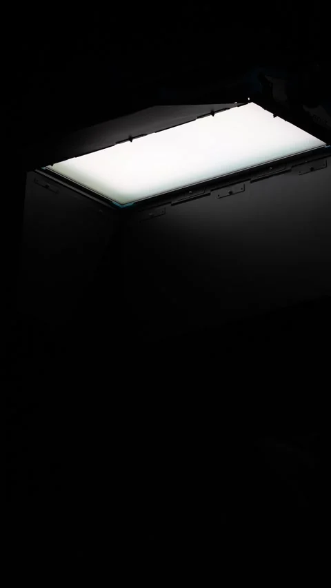 Professional studio LED panel light flickering in the dark Stock Footage 345796142
