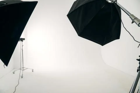 Professional studio light on white cyclorama. Photoshoot concept. Copy space Stock Photos