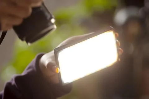 The professional studio lights on a black background. Stock Photos