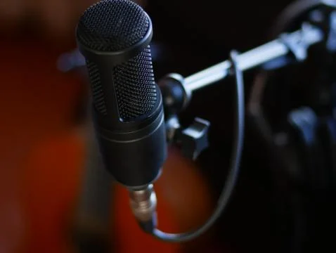 Professional Studio Microphone in recording studio on guitar background Foto stock