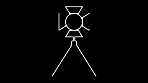 Professional studio spotlight on tripod stand with yellow light Stock Footage 323985122