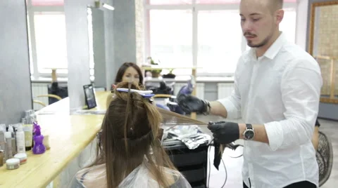 Professional stylist shows master class on hair coloring Stock Footage 69067328