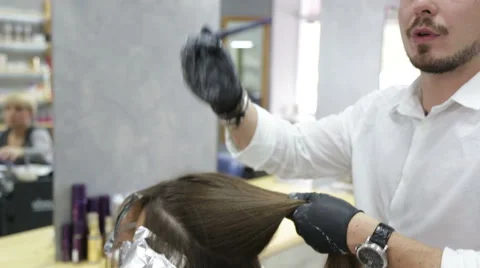 Professional stylist shows master class on hair coloring Stock Footage 69067506