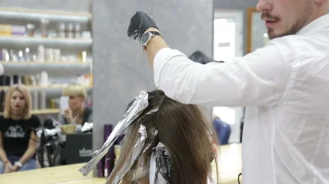 Professional stylist shows master class on hair coloring Stock Footage 69068358