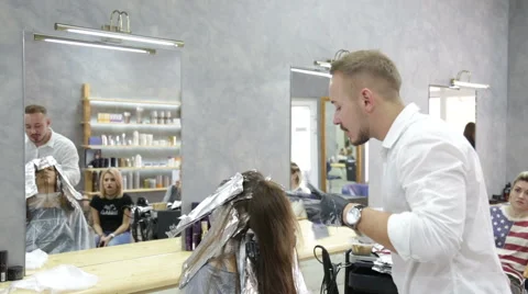 Professional stylist shows master class on hair coloring Stock Footage 69068405