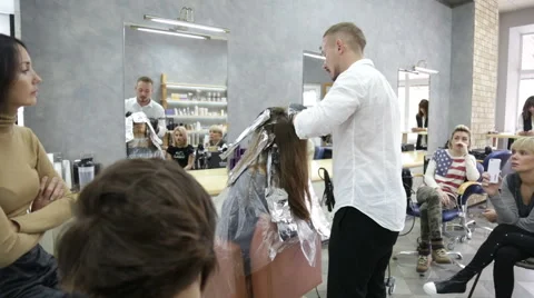 Professional stylist shows master class on hair coloring Stock Footage 69068934