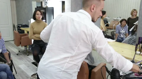 Professional stylist shows master class on hair coloring Stock Footage 69068983