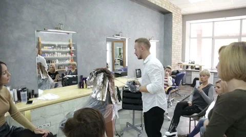 Professional stylist shows master class on hair coloring Stock Footage 69070008