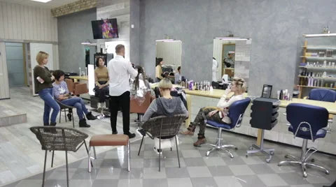 Professional stylist shows master class on hair coloring Stock Footage 69070222