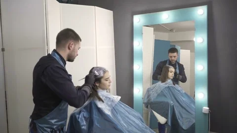 Professional stylist working with client Stock Footage 83965709