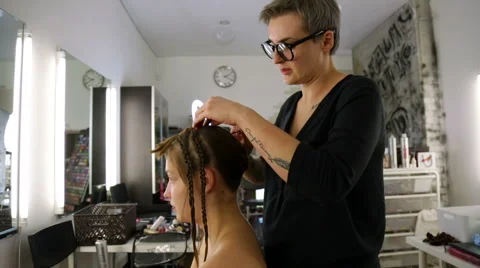 Professional stylists working on a way Video stock 68648168