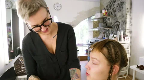 Professional stylists working on a way Video stock 68648486