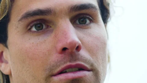 Professional surfer Alex Botelho being interviewed about big waves as passion Stock Footage 158692174