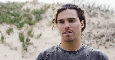 Professional surfer Alex Botelho introducing himself in beginning of interview Stock Footage 158697856