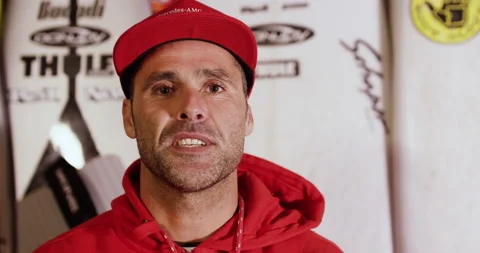 Professional surfer David Albaz talking about exciting things about Red Chargers Stock Footage 156602463