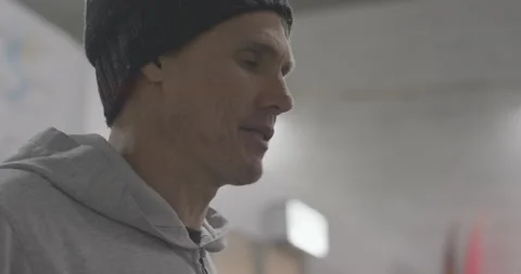 Professional surfer Jamie Mitchell talking about his skiing action story Stock Footage 160751199