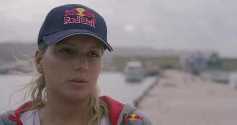 Professional surfer Maya Gabiera is talking about surfing waves and experiences Stock Footage 157128486