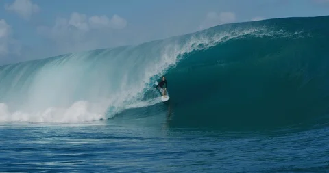 Professional surfer riding perfect wave Stock Footage 114805164