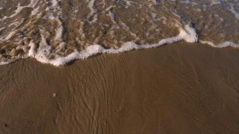 Professional surfer in the wind preparing the wind in the sea to the ocean. Stock Photos