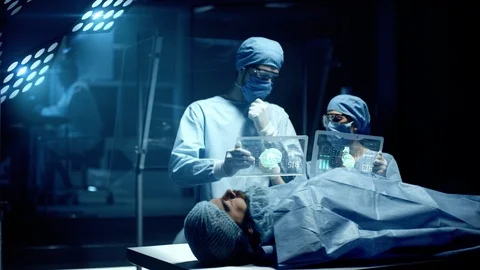 Professional Surgeon and Assistant Analyze Patient Diagnosis Data Stock Footage 120218235