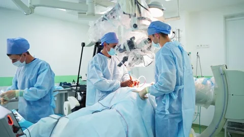 Professional Surgeons Performing Invasive Surgery Video stock 133034168