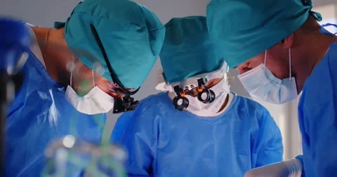 Professional Surgical Team Operating On Patient In Hospital 库存影片 327640872