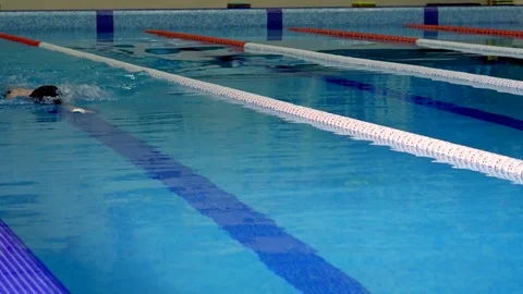 Professional swimmer training in the pool Stock-Footage 99180766