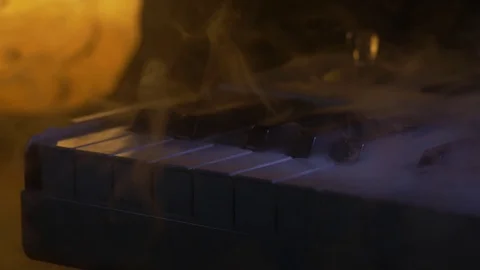 A professional synthersizer in a thick white smoke in a half-light. Stock Footage 116218077
