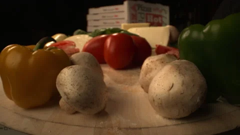 Professional Table of Pizza Ingredients with Zoom in and Hand Picking Tomato Stock-Footage 130413110