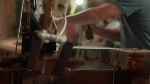Professional tapestry weaver working at antique loom Stock Footage 327508264