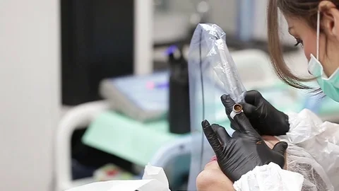 Professional tattooist making permanent make up Stock Footage 73767385