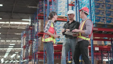 Professional teamwork warehouse worker working in warehouse. While manager or Video stock 217748982