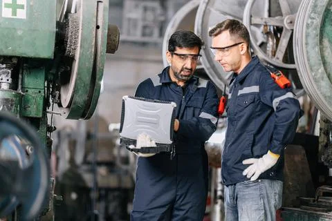 Professional Technician engineer assist team work maintenance service old m.. Stock Photos