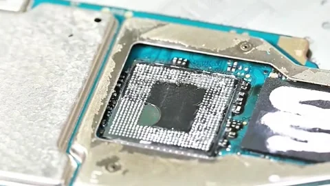 Professional Technician Removing IC Chip from Smartphone Motherboard Stock Footage 333610565
