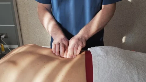 Professional Therapeutic Back Massage in Progress Stock Footage 266818265