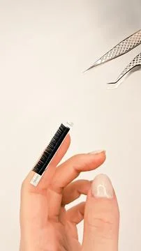 Professional tools and accessories for safe and precise lash application work Stock Photos